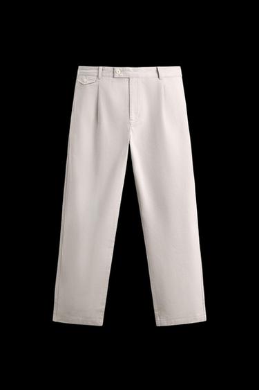 RELAXED FIT PLEATED TROUSERS - Stone by Zara