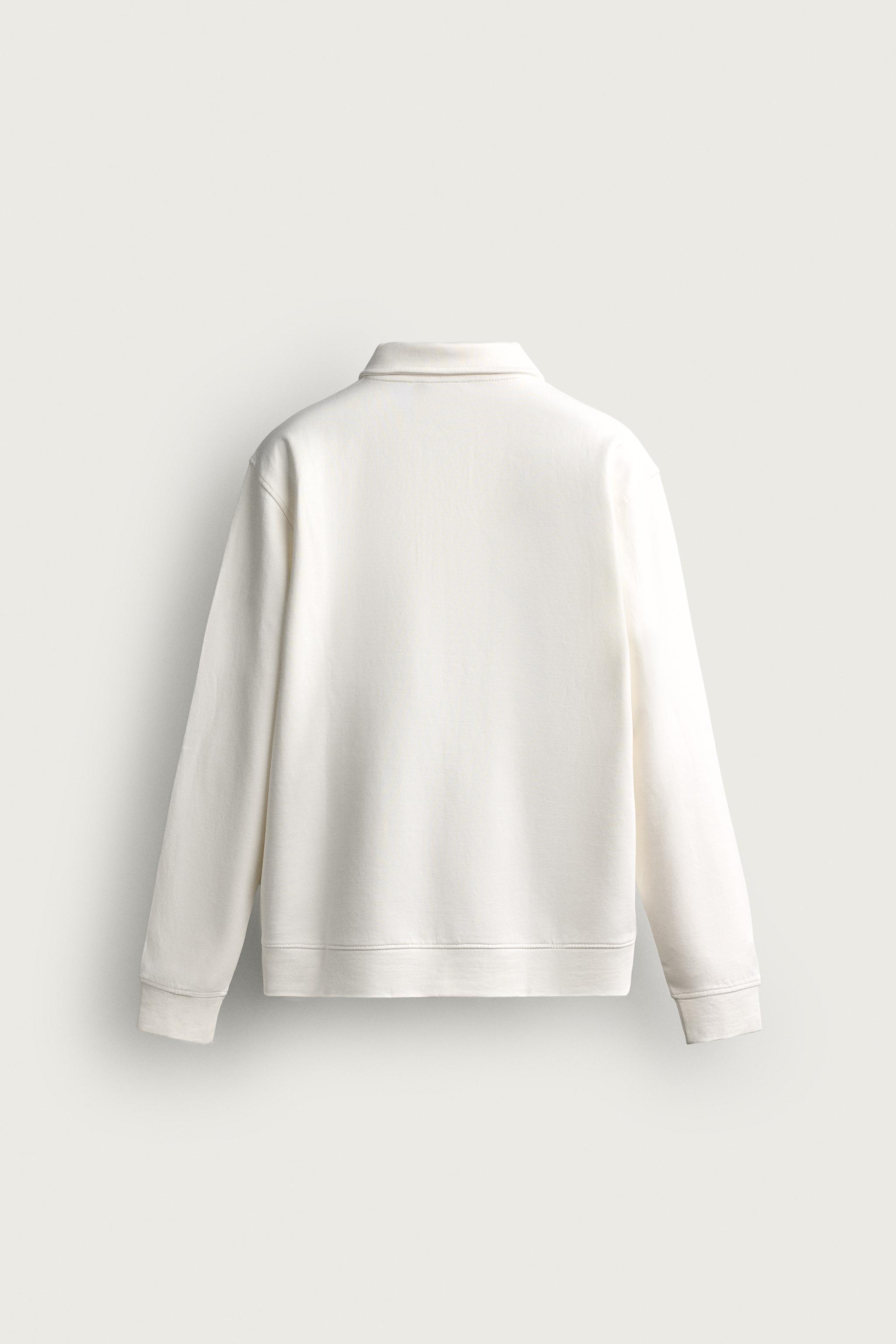 SWEAT POLO INTERLOCK ZIPPÉ