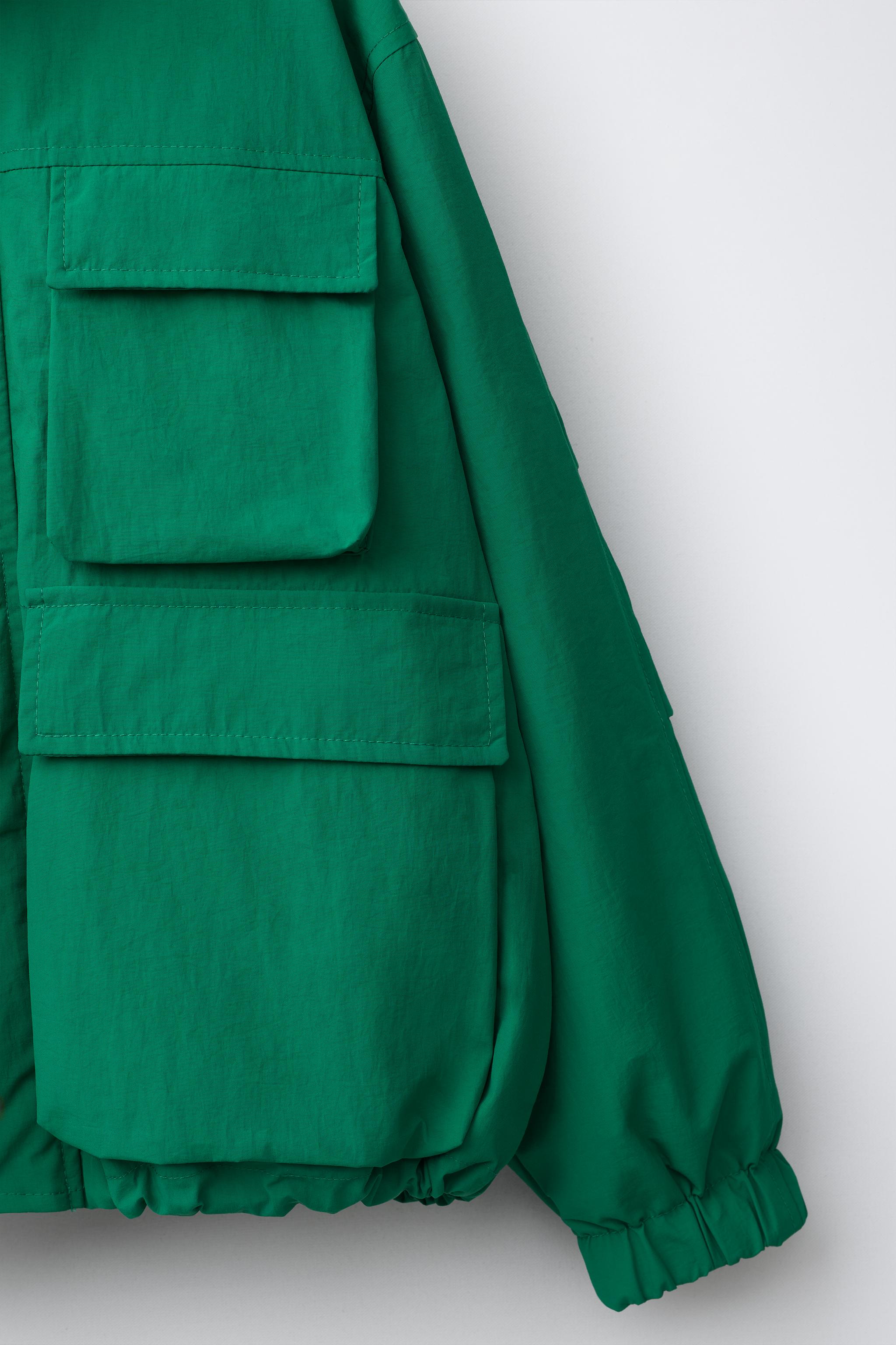BLOUSON À CAPUCHE DÉPERLANT