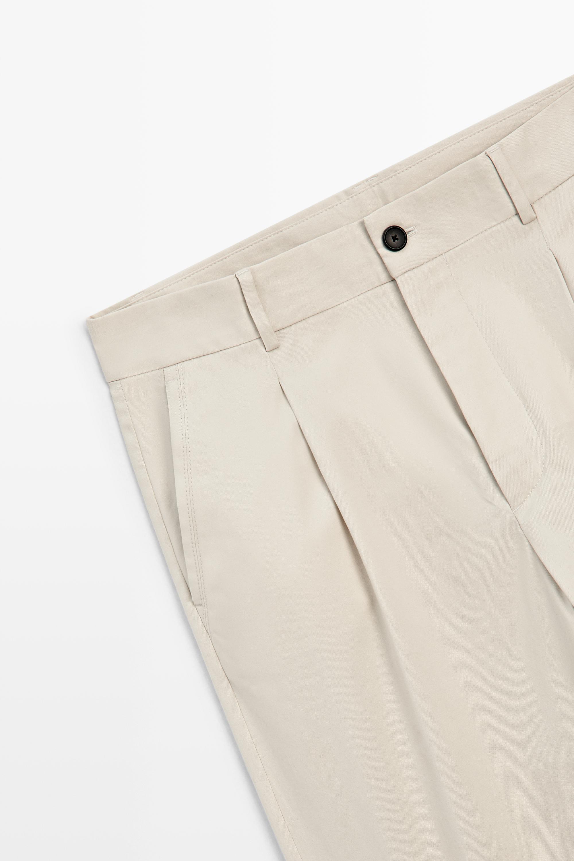 Pantalon relaxed fit à pinces