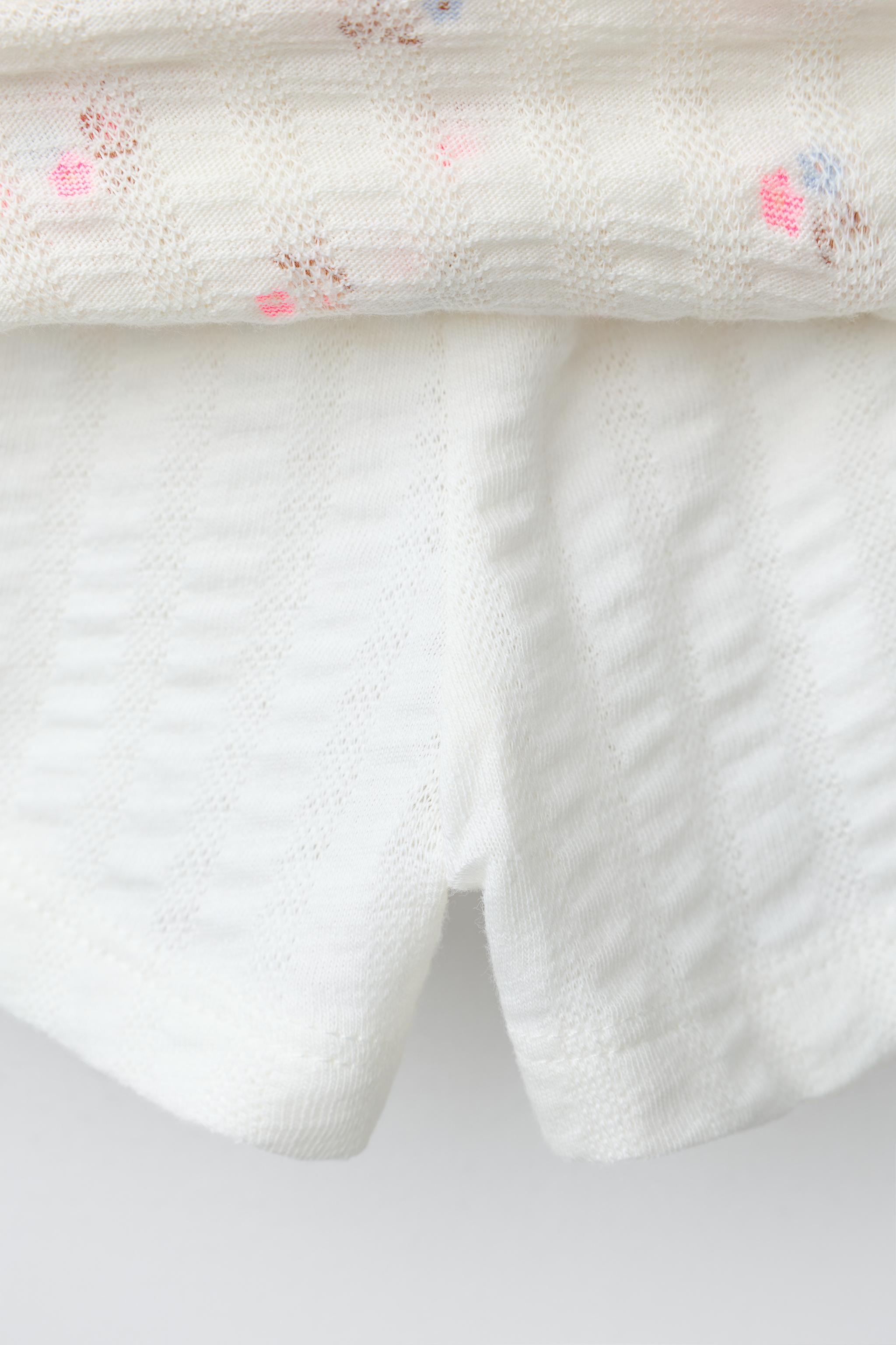 FLORAL TEXTURED SKORT — Ecru