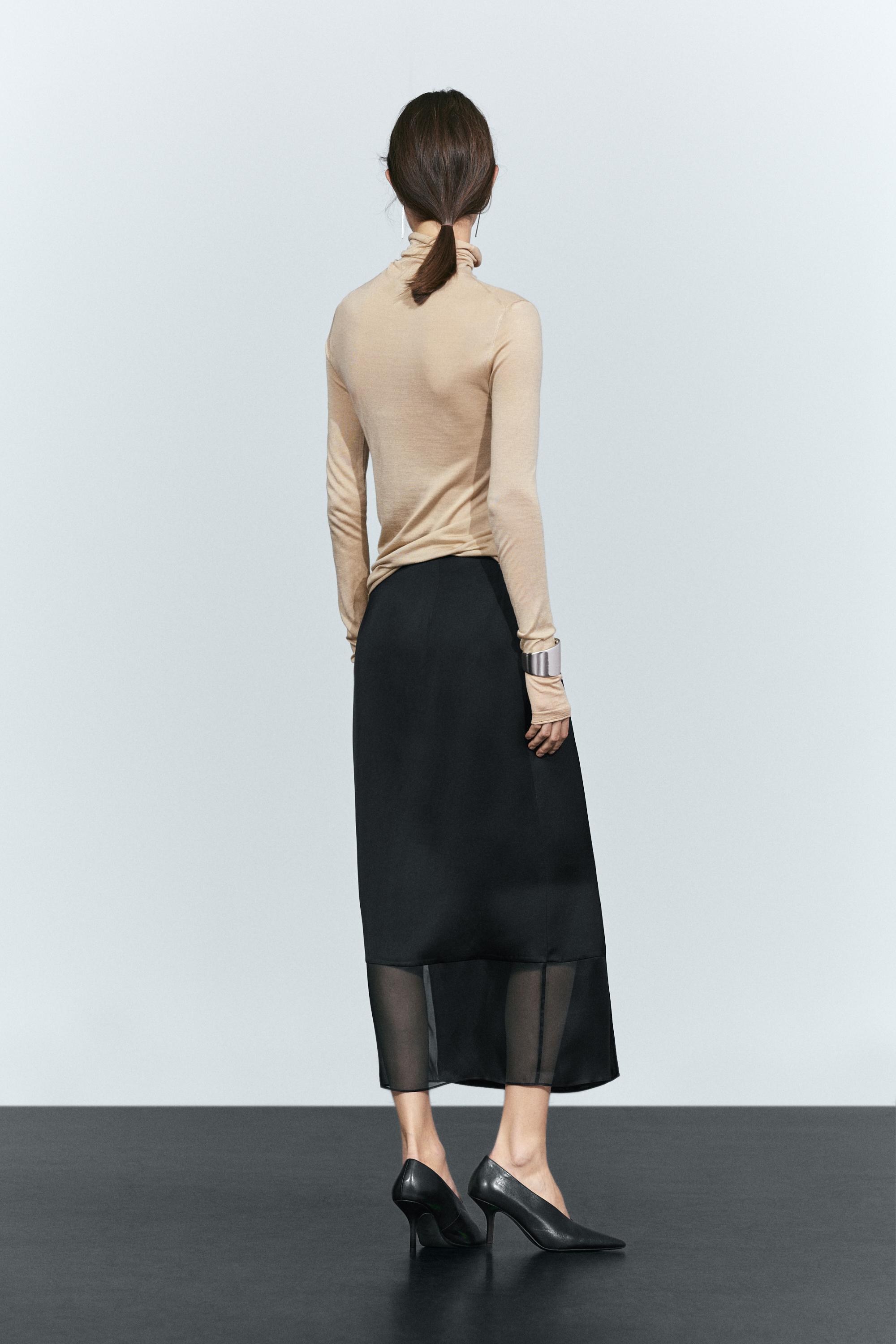 Jupe midi droite double coupe semi-transparente