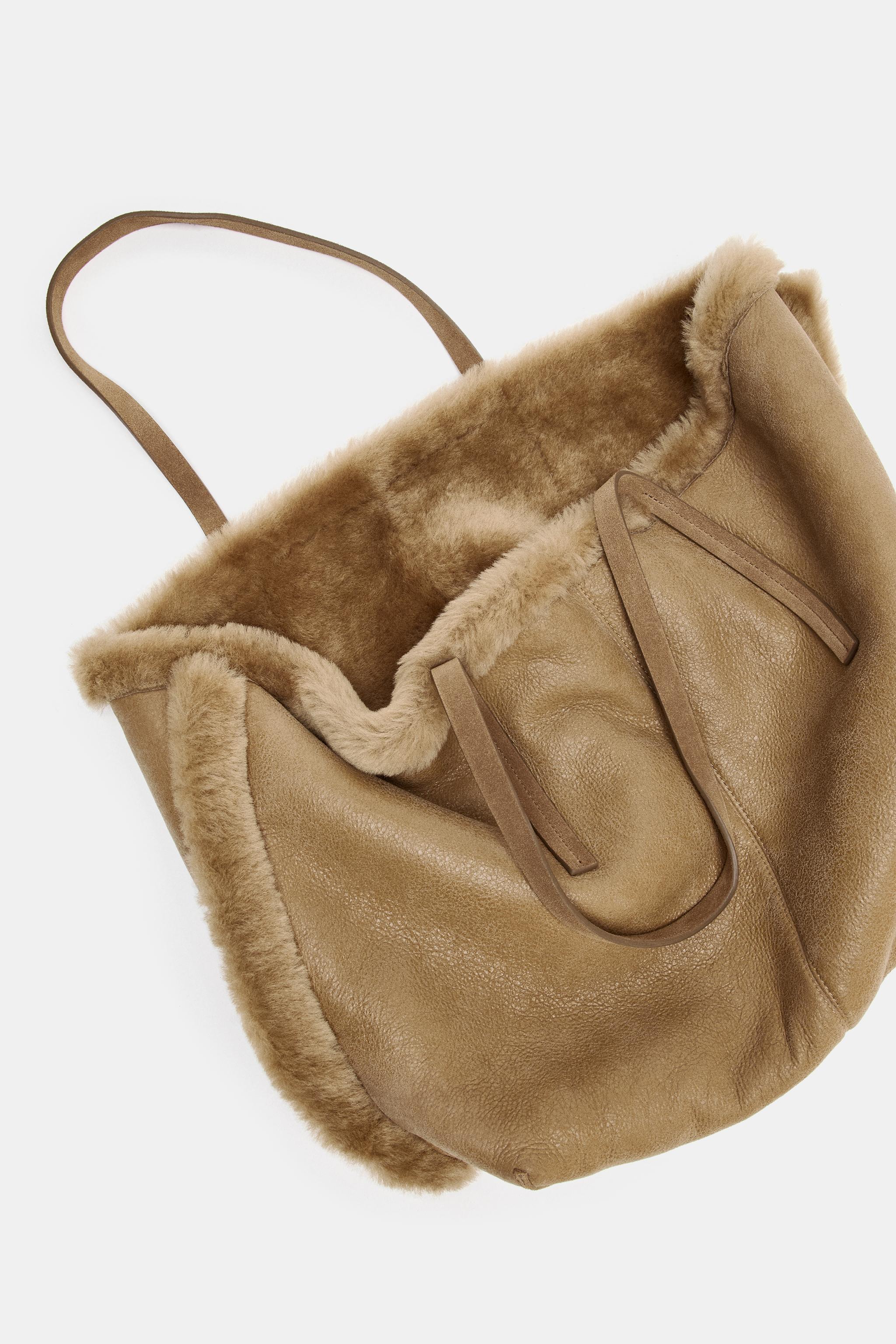 REVERSIBLE LEATHER BAG