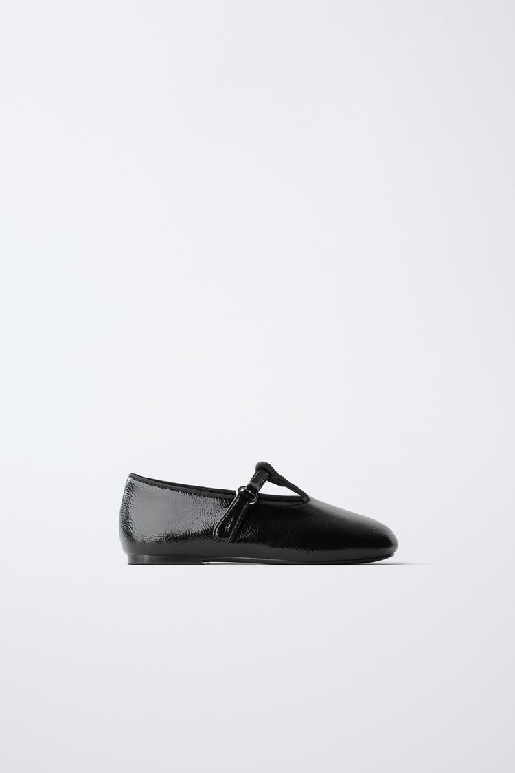 PATENT BUCKLE BALLET FLATS — Black