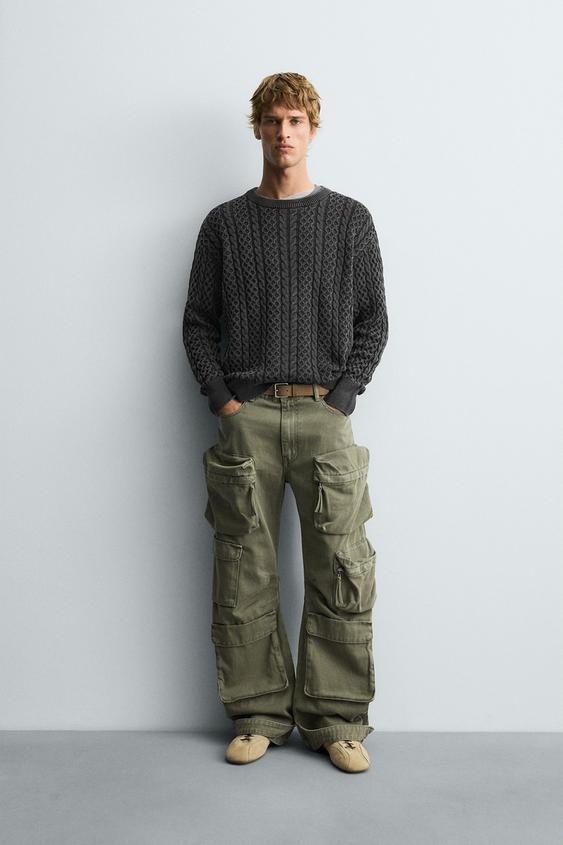 GARMENT-DYED CABLE KNIT SWEATER