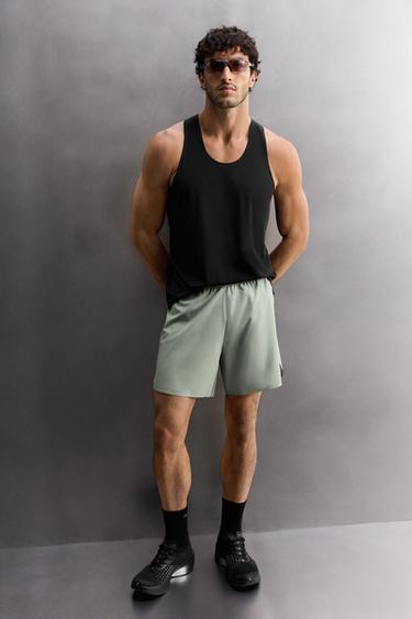 Zara LIGHTWEIGHT PERFORATED SHORTS - Light blue