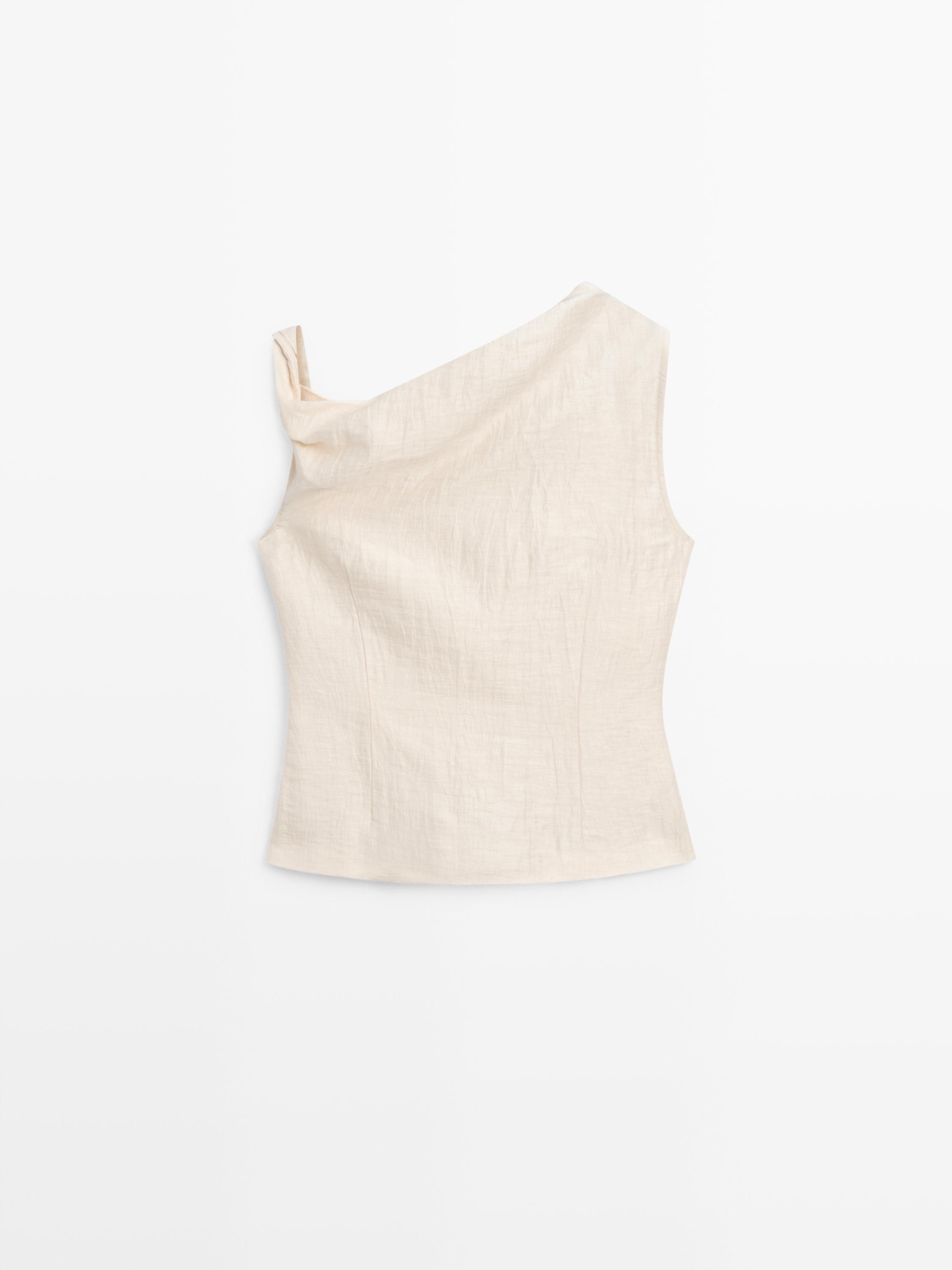 Asymmetric top with knot detail