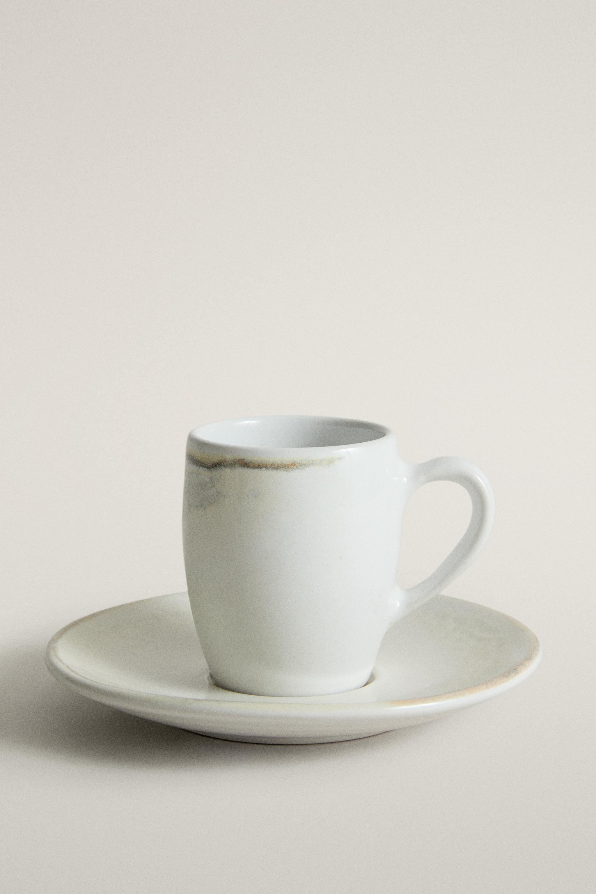 STONEWARE COFFEE CUP AND SAUCER