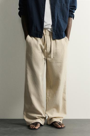 بنطلون RELAXED FIT جاكار مغسول - مِحْمر الخاص بـ Zara