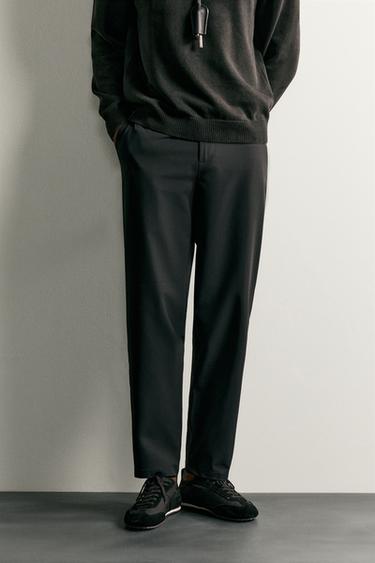 PANTALÓN TÉCNICO REGULAR FIT CONFORT - Negro de Zara