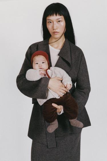 Gilet en maille épaisse à capuche avec laine - Beige clair de Zara