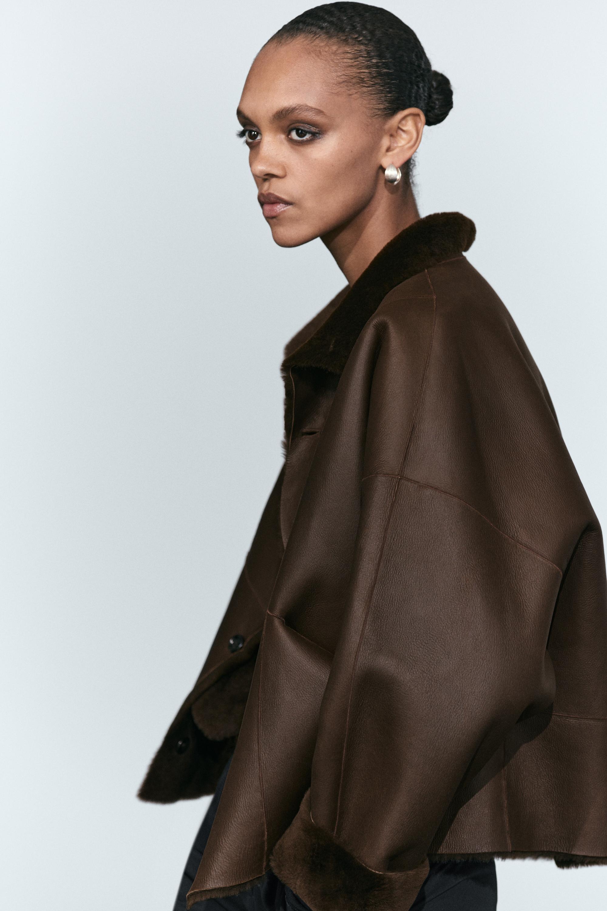 Manteau réversible en cuir avec fourrure