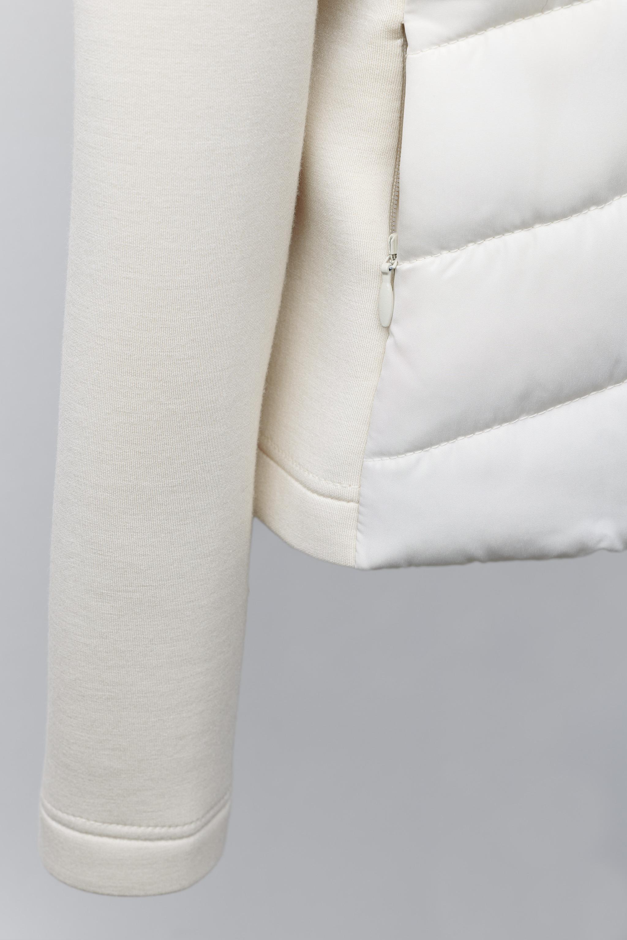 PUFFER JACKET WITH NEOPRENE EFFECT SLEEVES