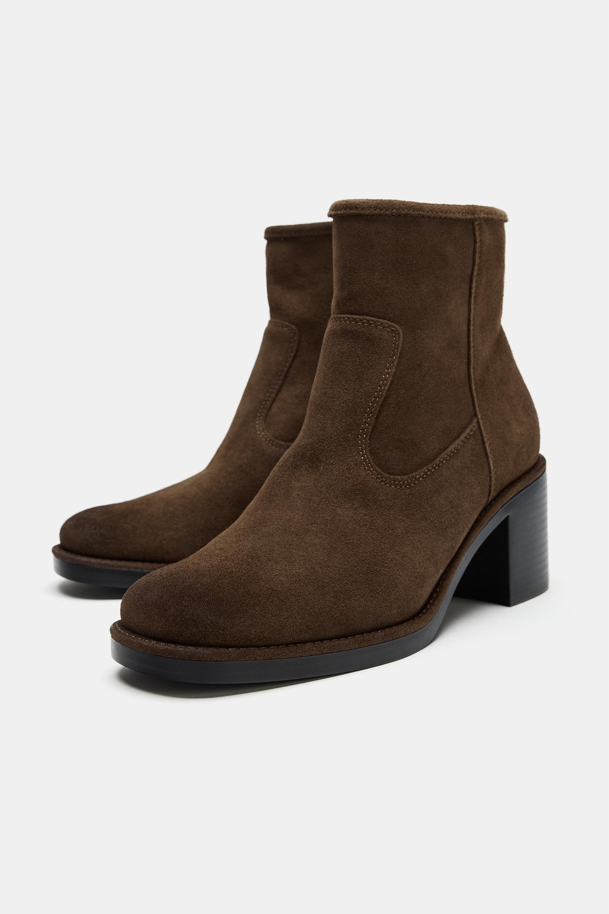 BOTTINES À TALONS EN CROÛTE DE CUIR
