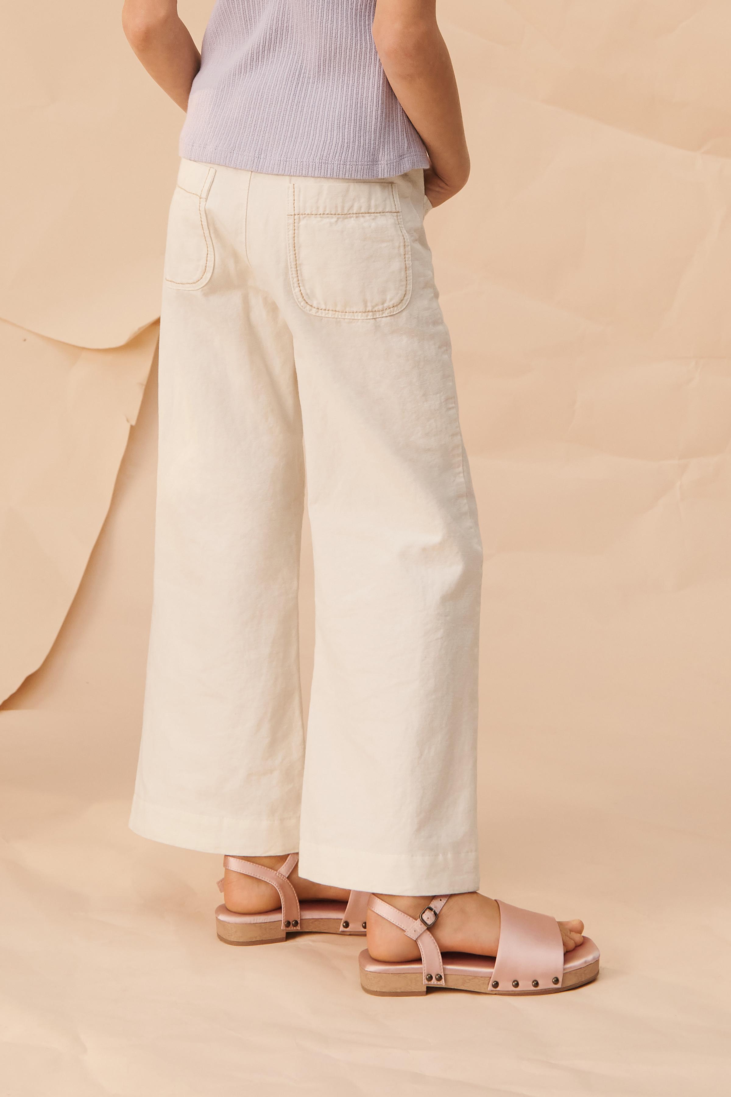 PANTALON FLARE SURPIQÛRES LIMITED EDITION