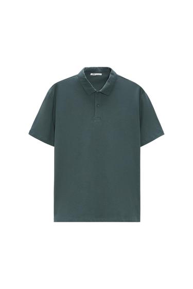 Dark green short-sleeve polo shirt with collar and buttons, on a white background.