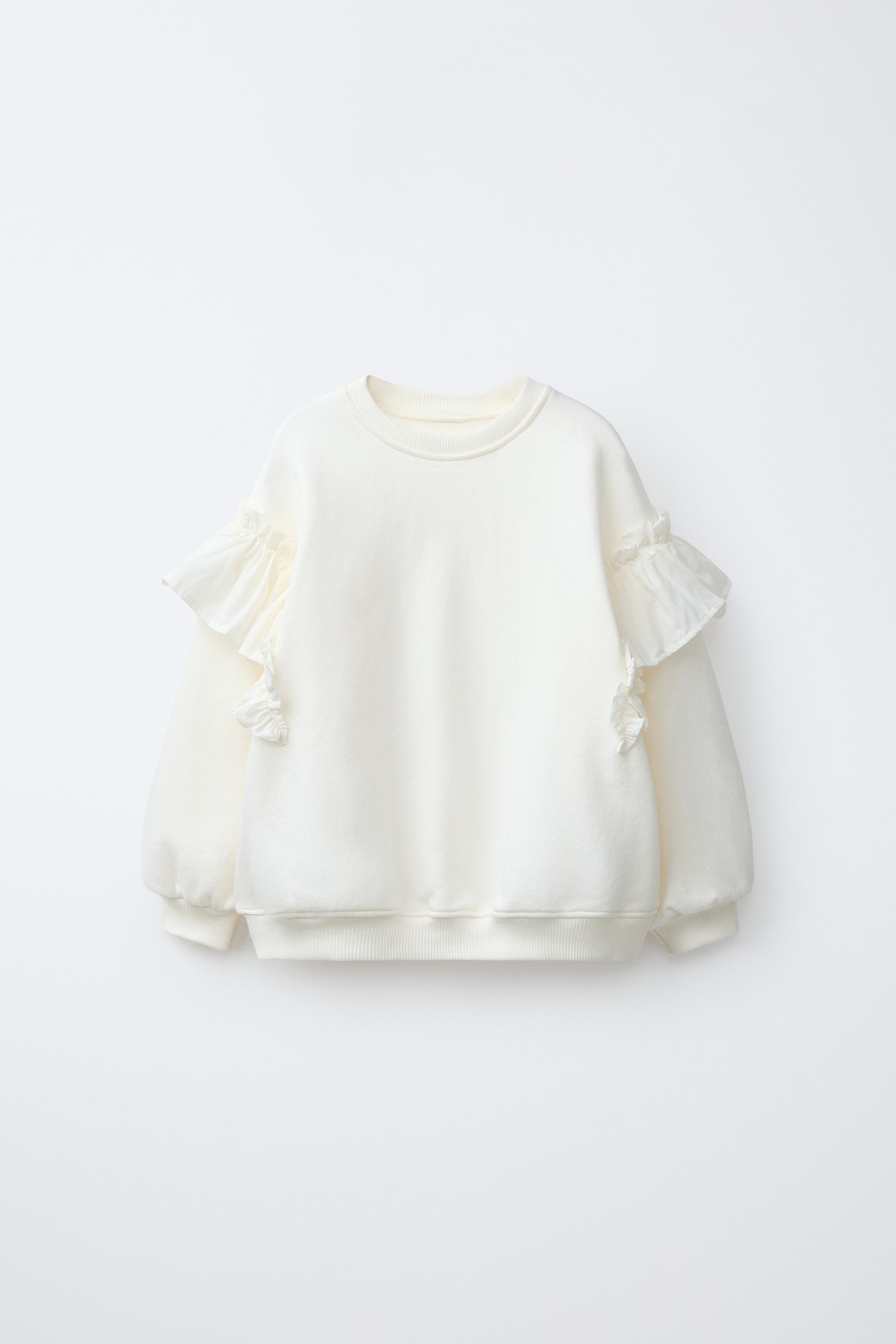 SWEAT ROMANTIQUE À VOLANTS
