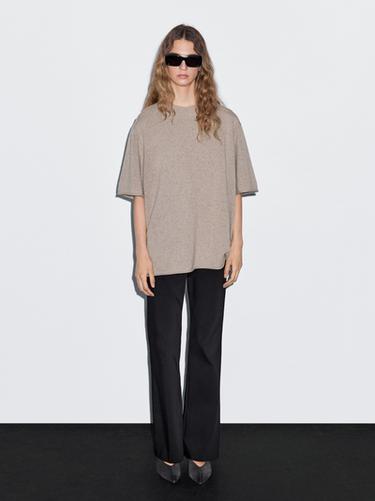 Jersey punto oversize manga corta - Negro oro de Zara