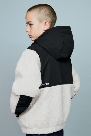 CAZADORA BORREGUILLO Y NYLON - Blanco roto de Zara