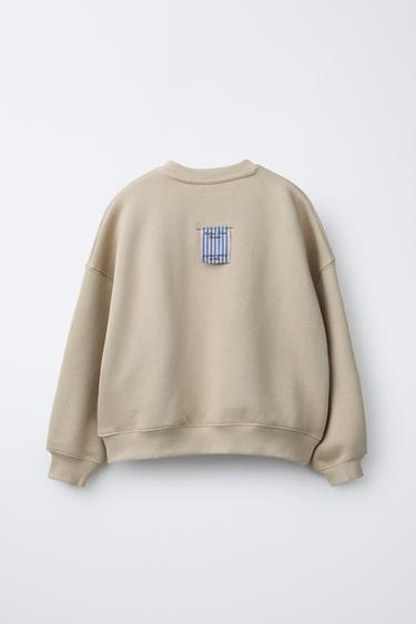 SWEATSHIRT WITH SLOGAN AND FLOWERS - camel by Zara - Image 1