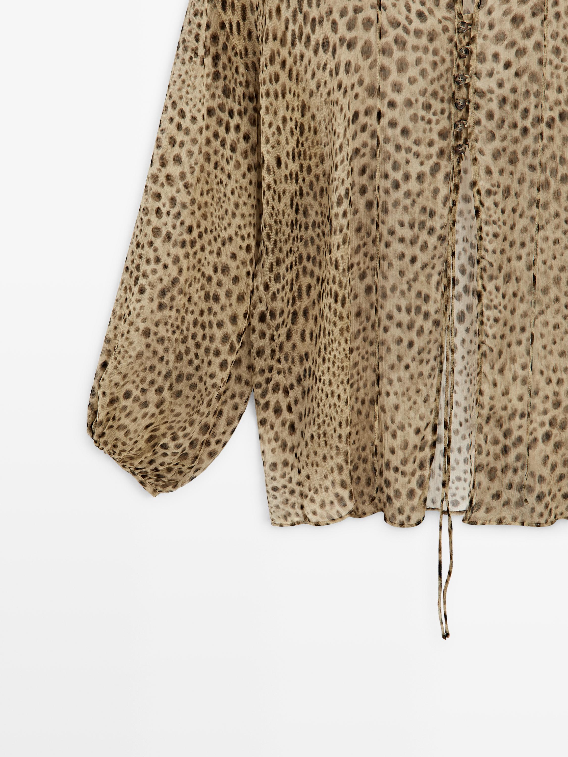 Flowing animal print blouse