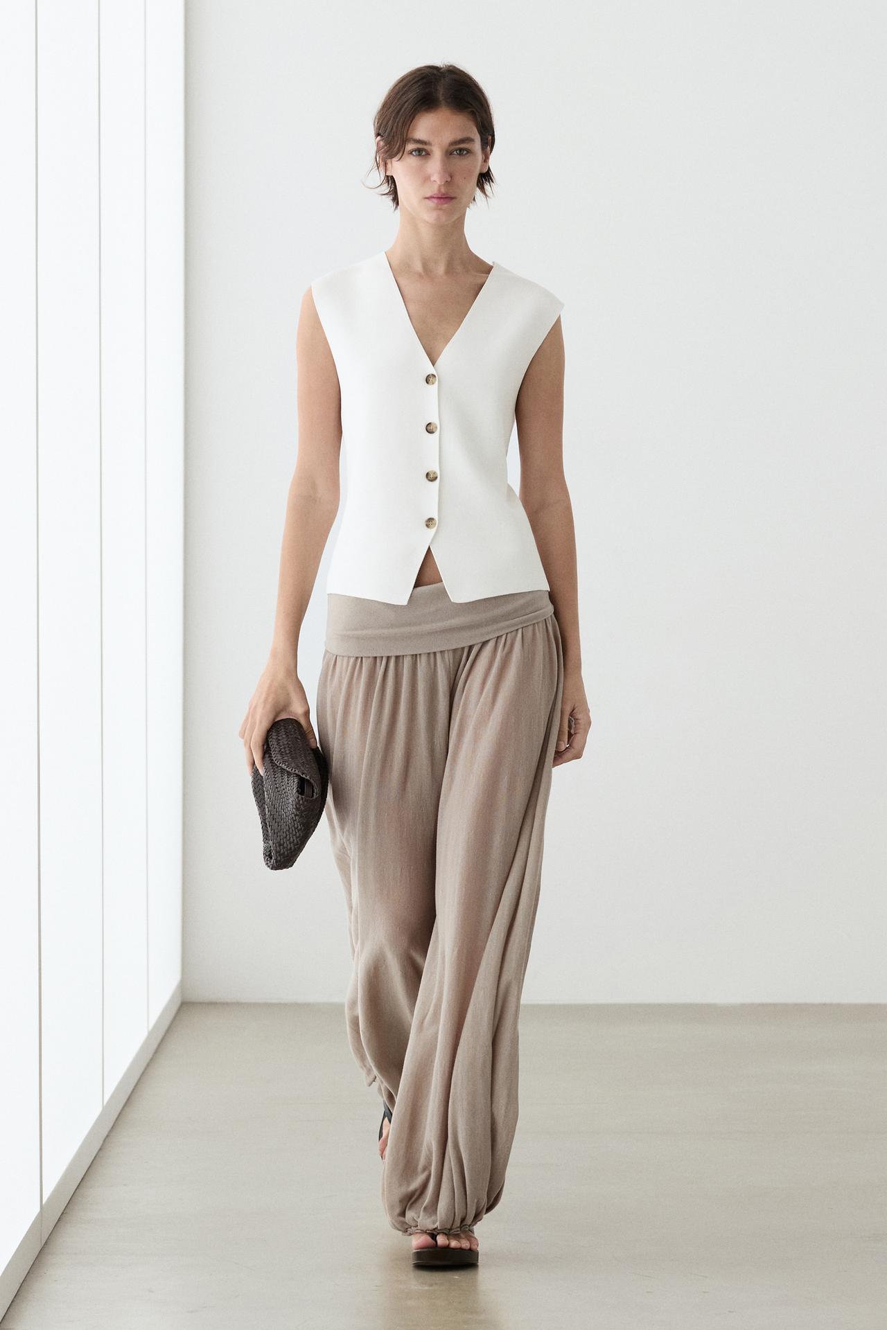 Knit waistcoat with button details — White