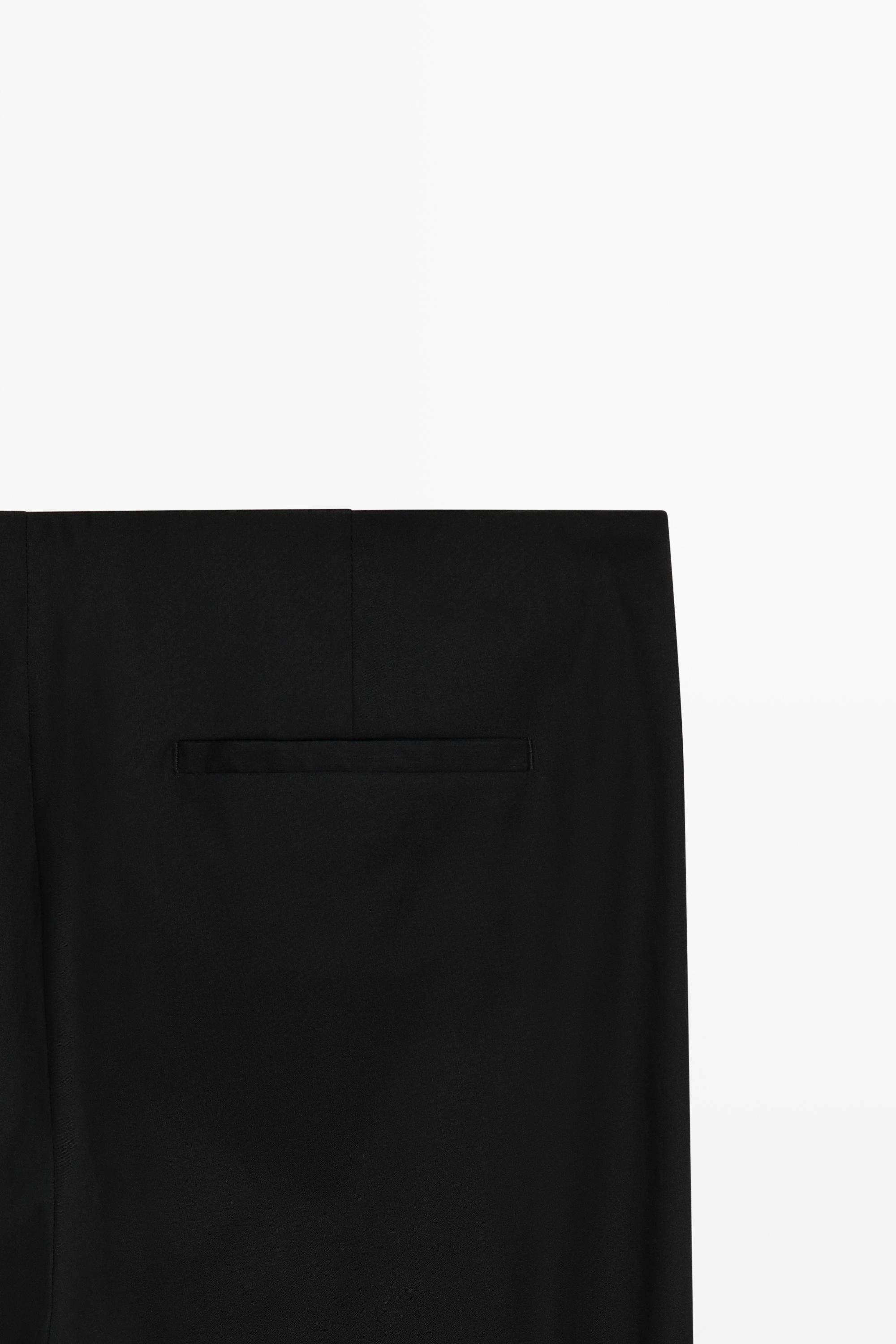 Flare fit pants with hem detail