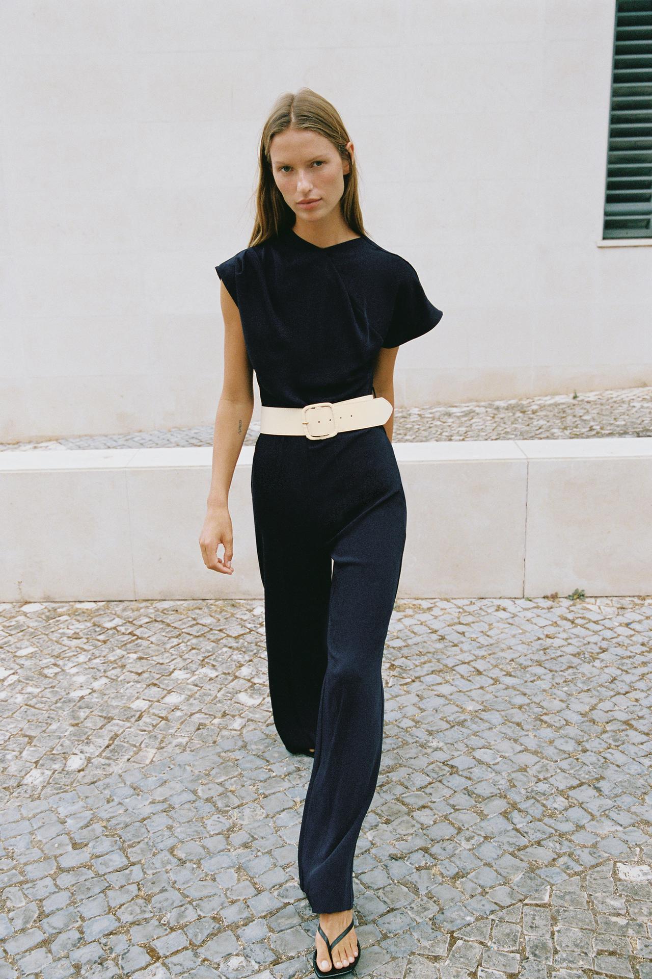 ASYMMETRIC SLEEVE BELTED JUMPSUIT — Navy blue