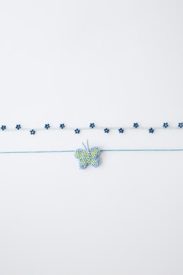 LOT DE DEUX COLLIERS FANTAISIE PAPILLON ET FLEURS - Bleu de Zara - Image 1