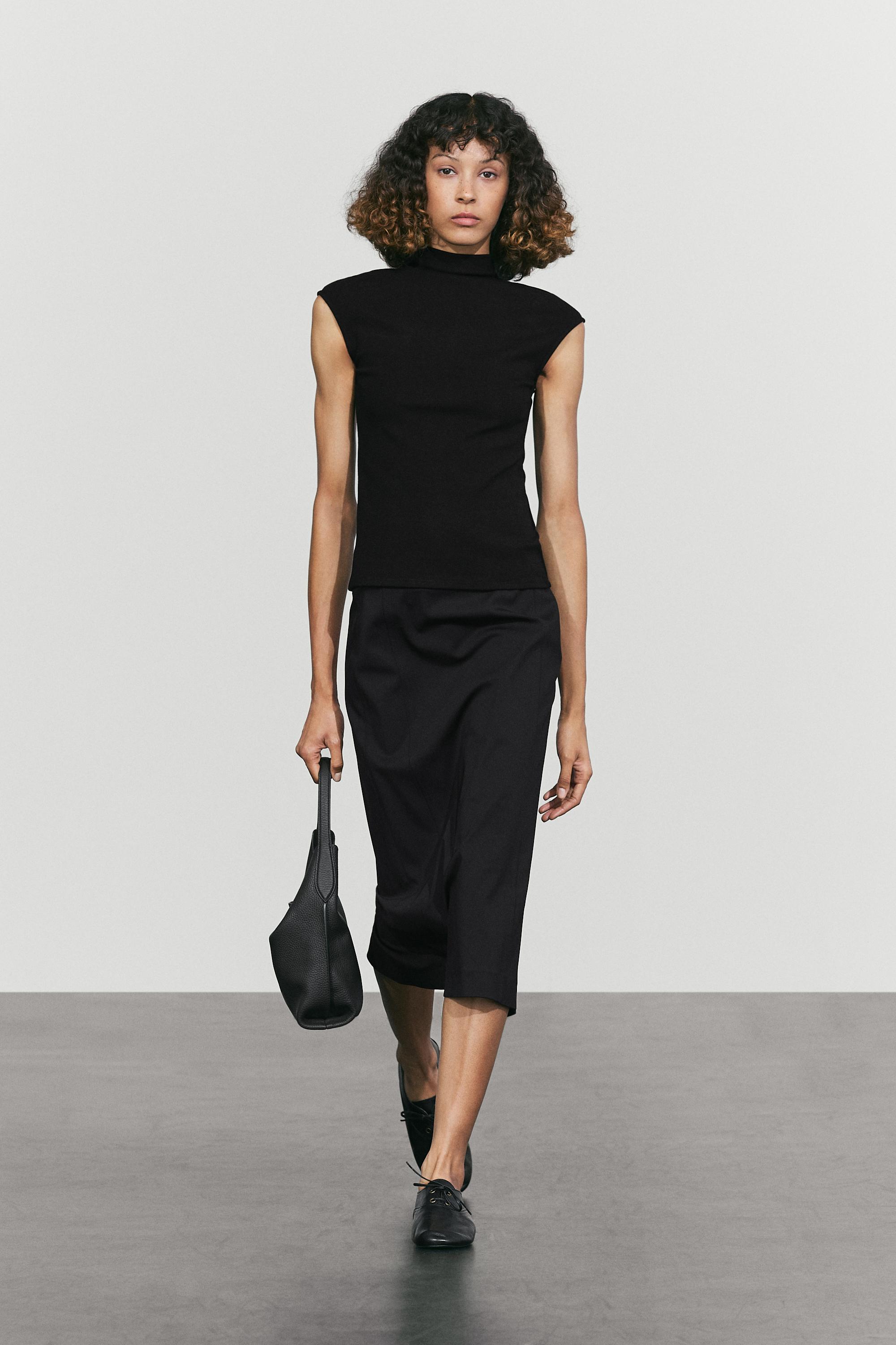 Funnel neck knit top — Black