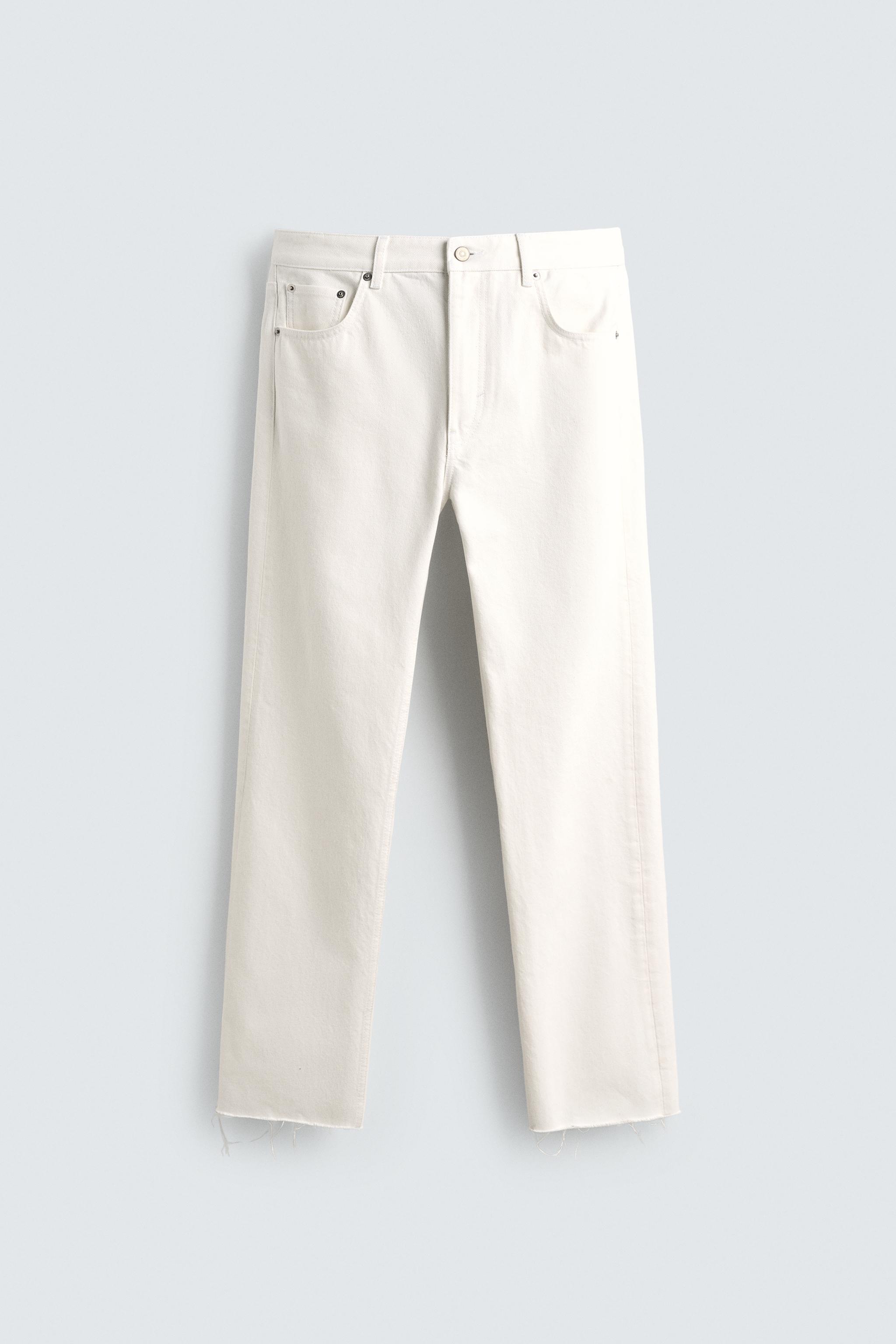 IRREGULAR HEM STRAIGHT FIT JEANS