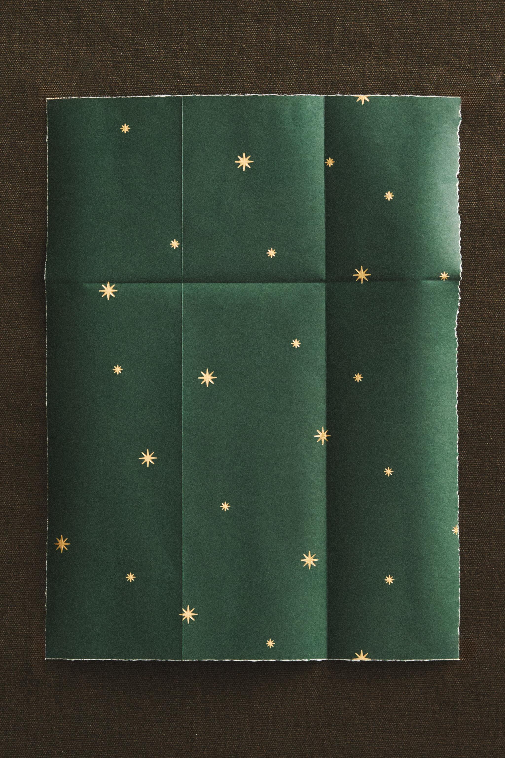 SET OF CHRISTMAS STAR GIFT WRAPPING PAPER AND RIBBON BOW