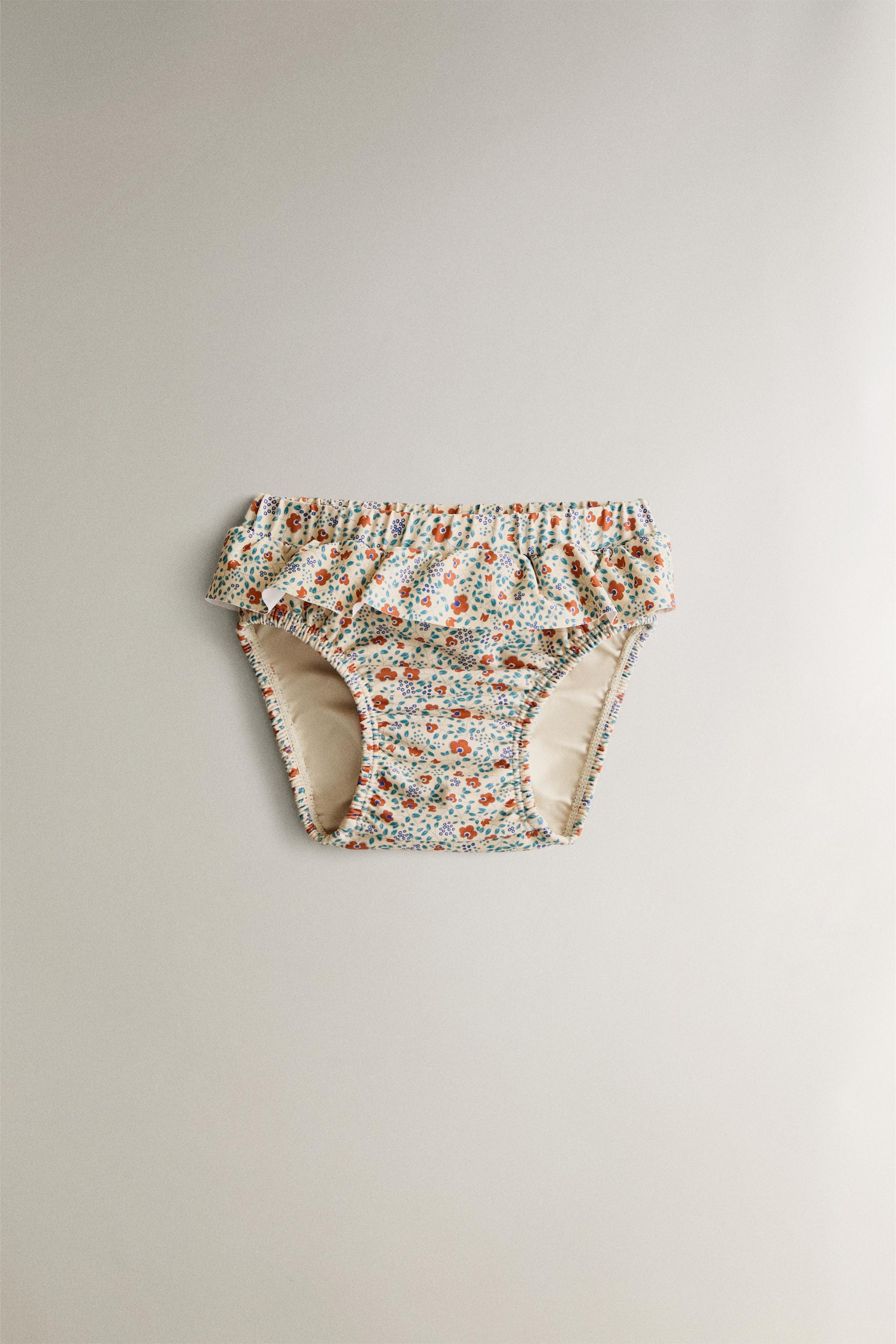 CULOTTE DE PLAGE BÉBÉ À VOLANT FLEURS