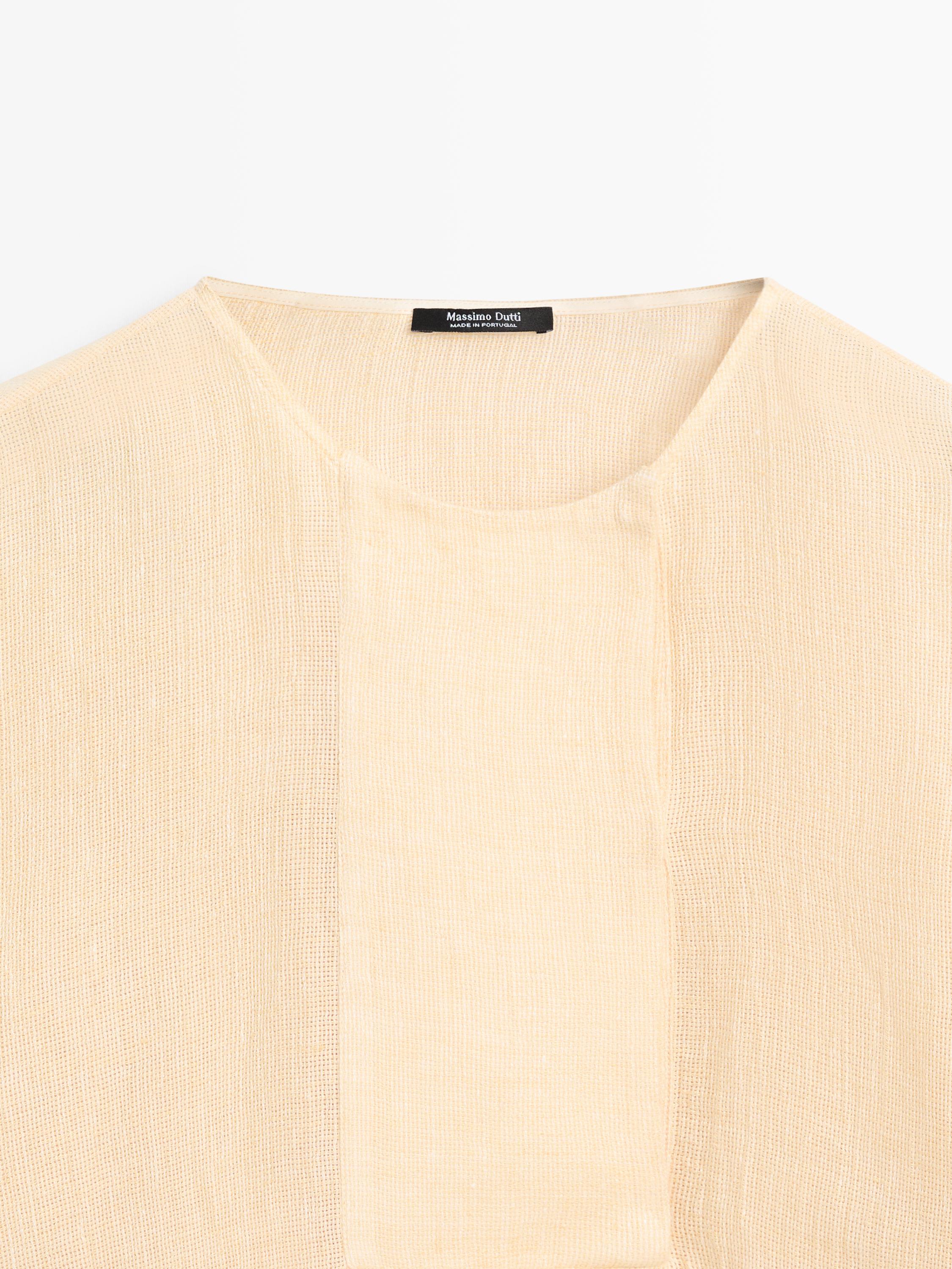 Flowing linen blouse with chest detail
