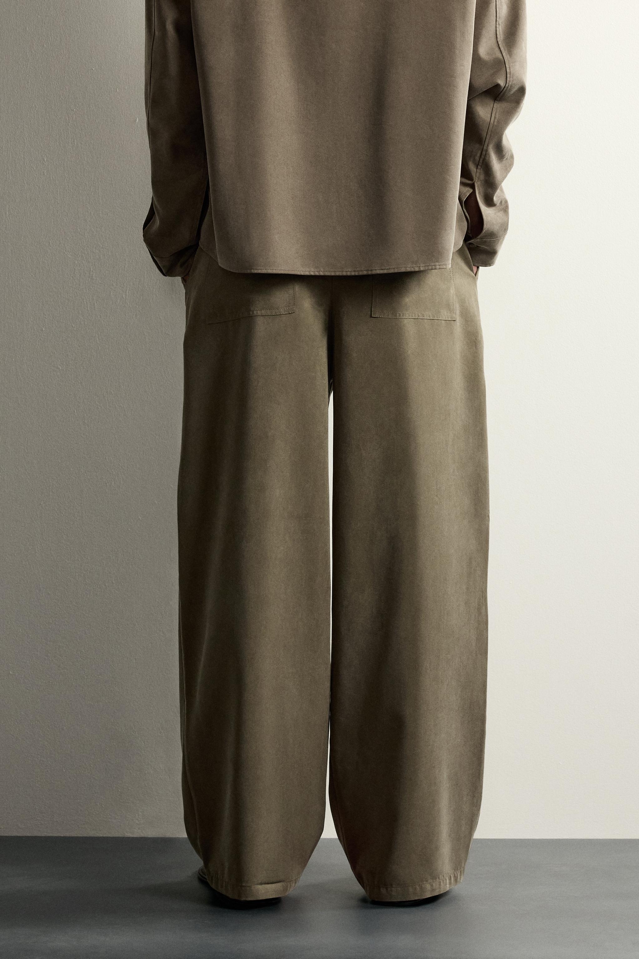 RELAXED FIT FLOWY PANTS