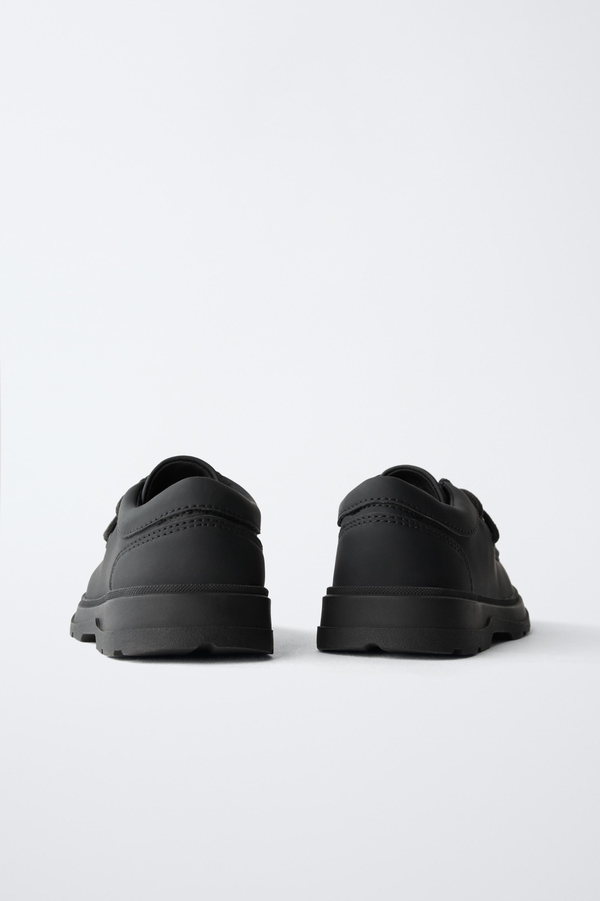 CHAUSSURES À BORD LARGE AVEC LISERÉ