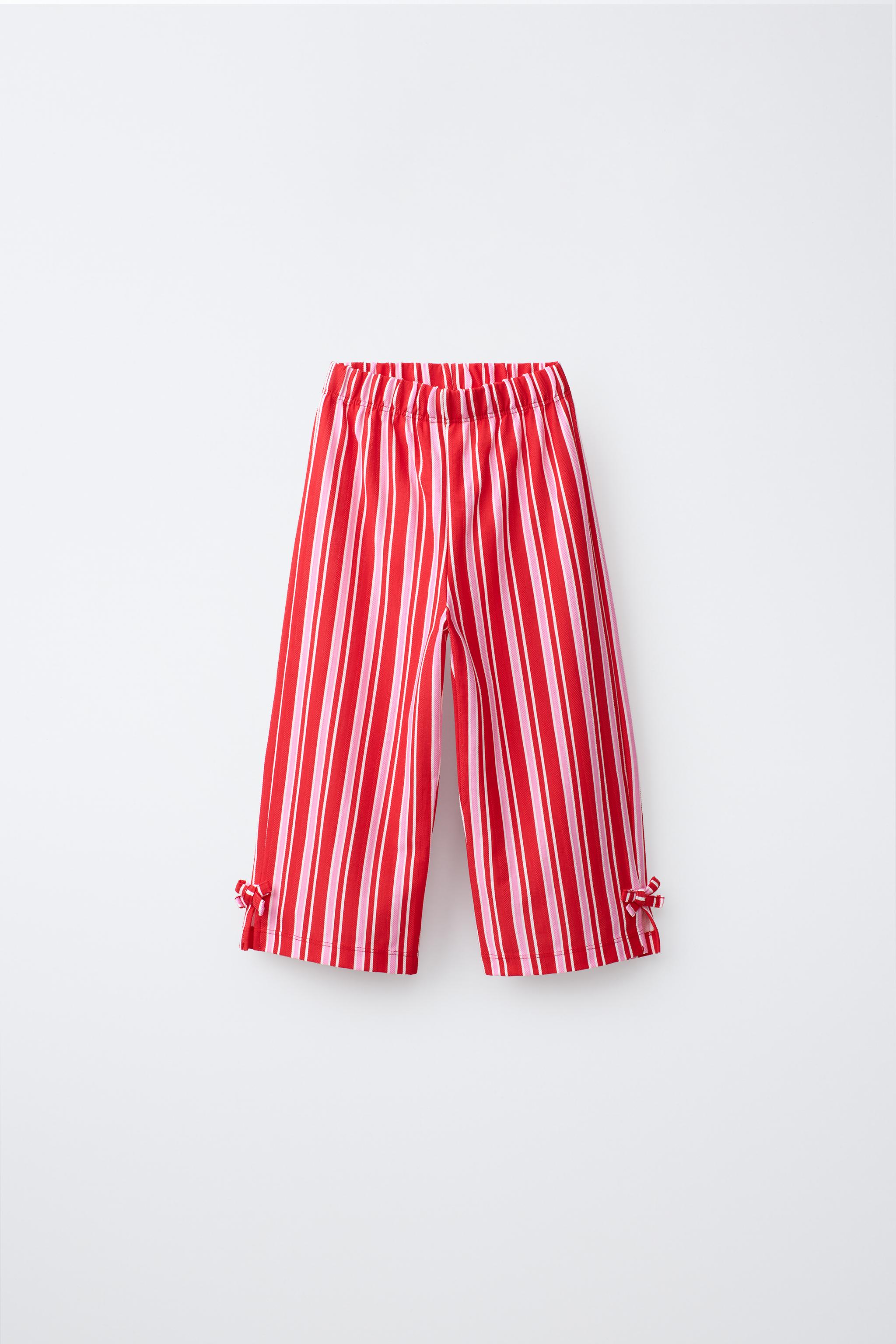 STRIPED TROUSERS WITH BOWS — Bright red