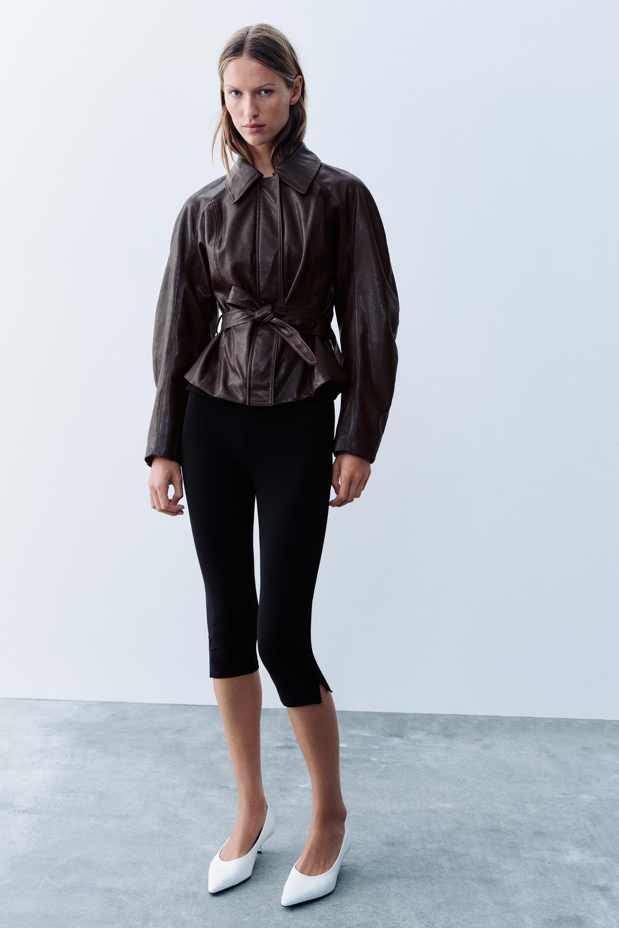 VESTE À CEINTURE EN MATIÈRE SYNTHÉTIQUE