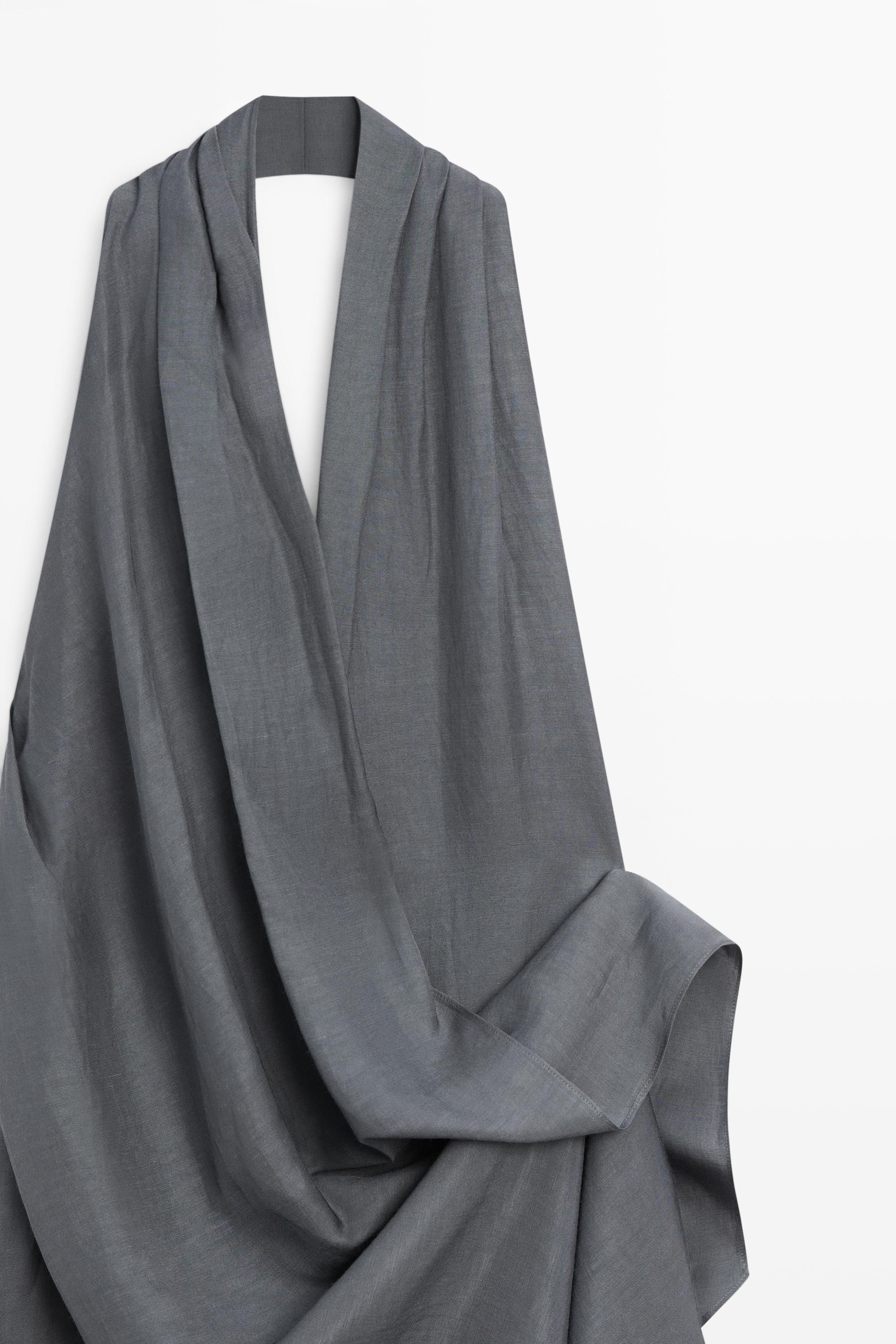 Asymmetric draped jumpsuit