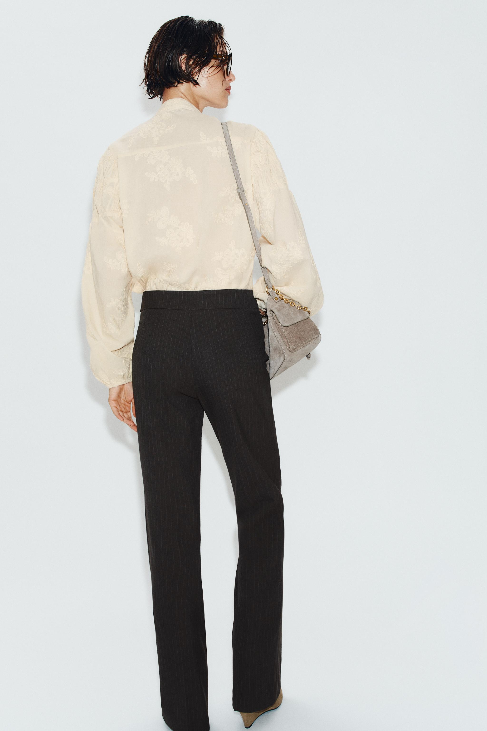 BUCKLE FLARE PANTS