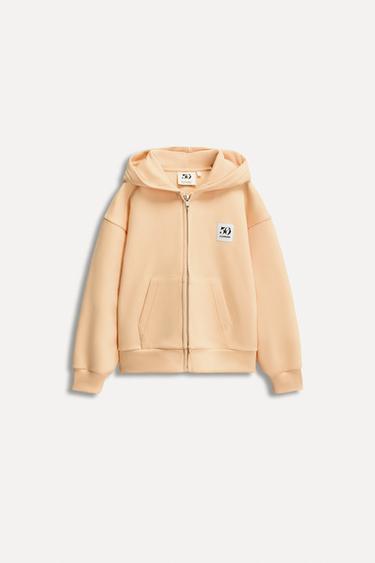 1/2-6 AÑOS/ SUDADERA CREMALLERA ETIQUETA 50TH ANNIVERSARY - Mandarina de Zara