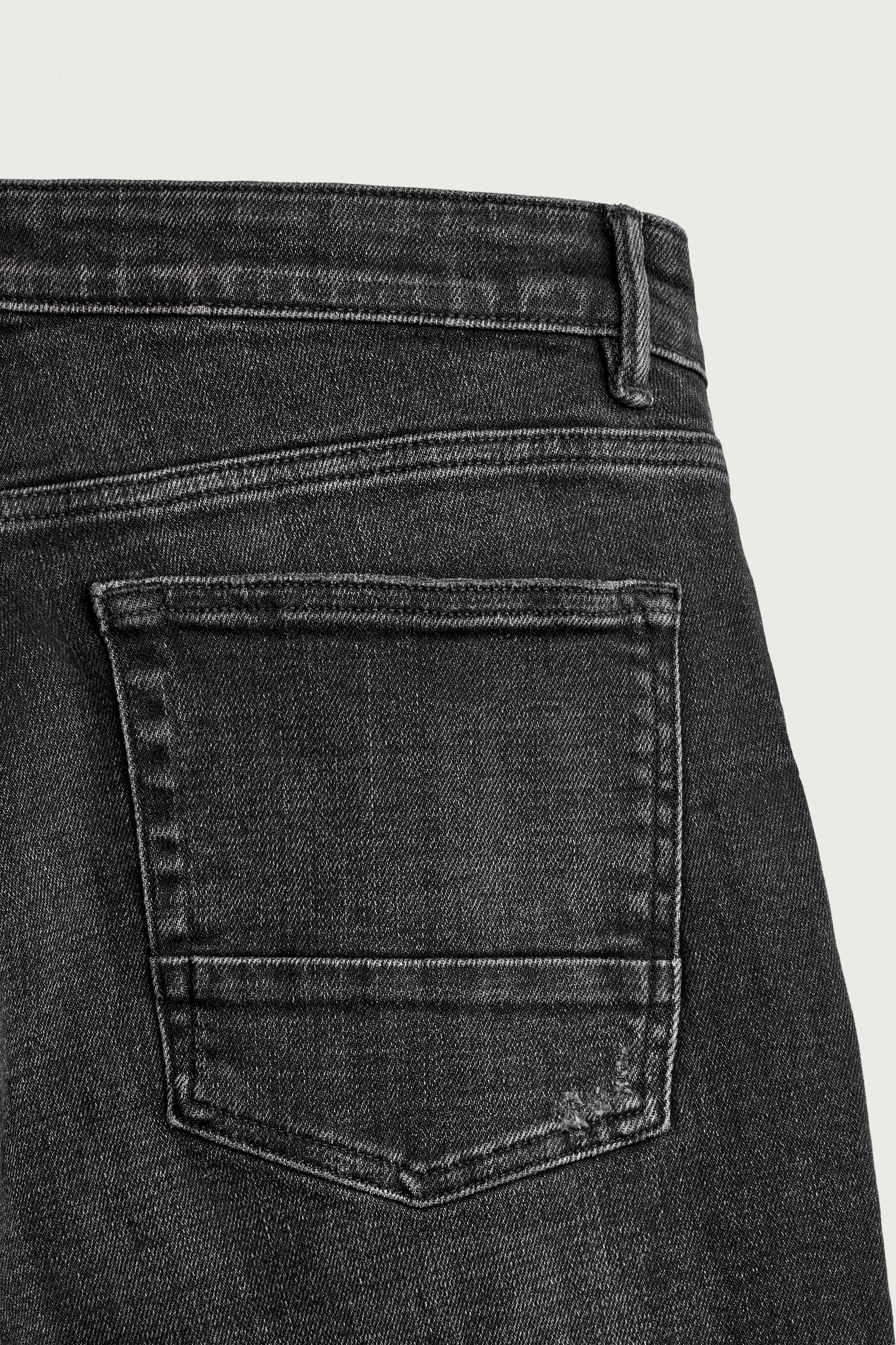 DISTRESSED SKINNY FIT JEANS