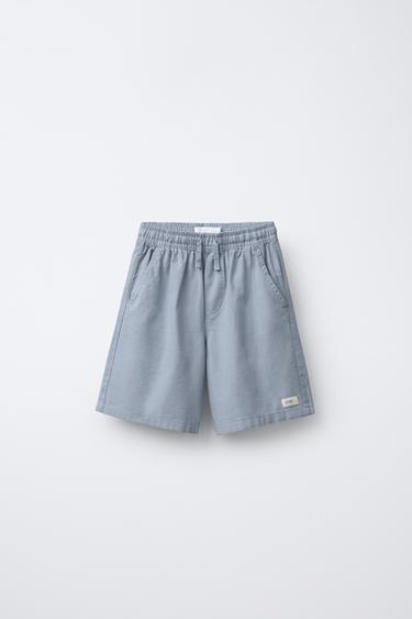 Zara COTTON LABEL BERMUDA SHORTS - Light blue