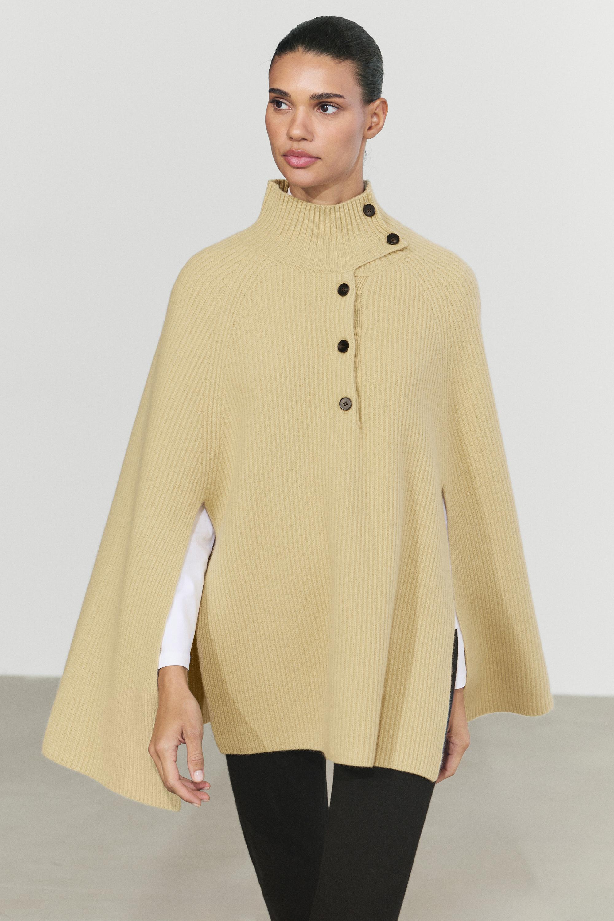 100% wool knit cape with button detail