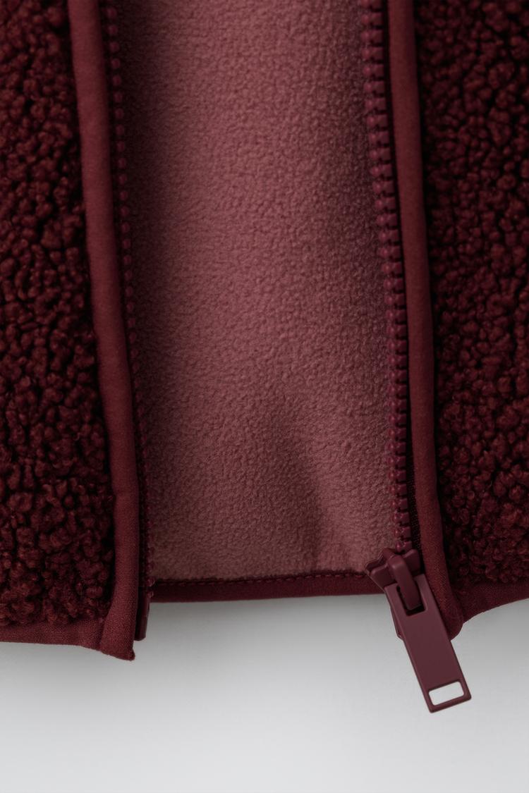 Chaqueta con capucha de pelo sintético 8