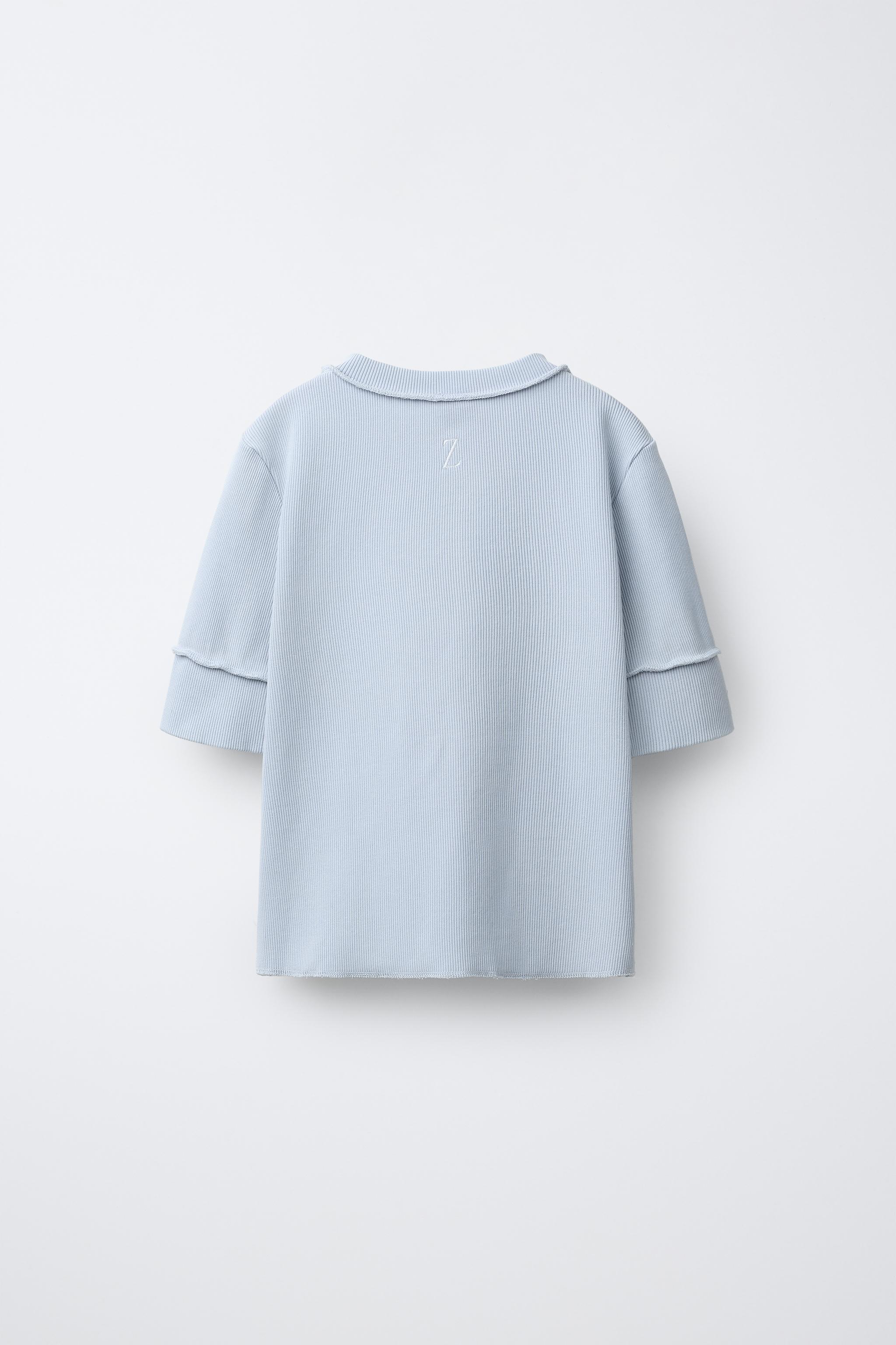T-SHIRT SURJETÉ À BOUTONS