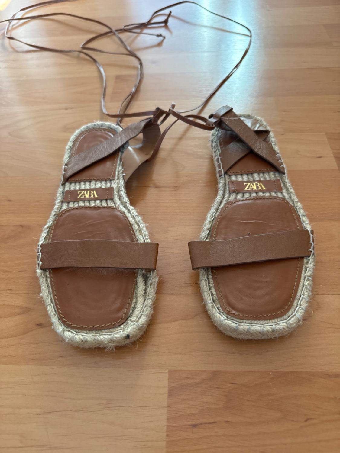 LEATHER AND JUTE TIE-UP FLAT SANDALS