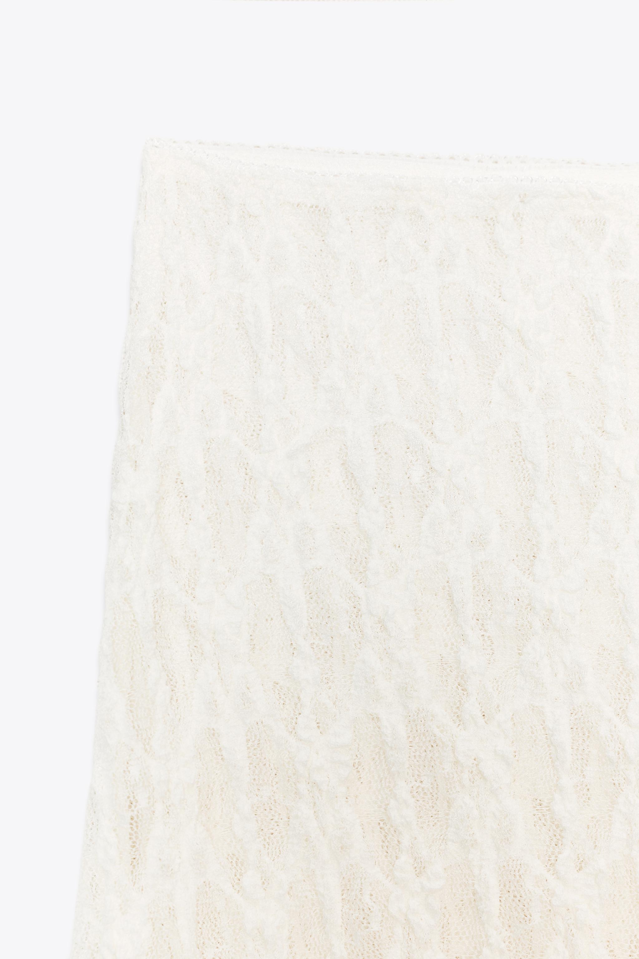 JUPE LONGUE ÉVASÉE EN DENTELLE
