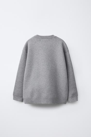 PULL EN MAILLE GRAFFITI - Gris de Zara - Image 1