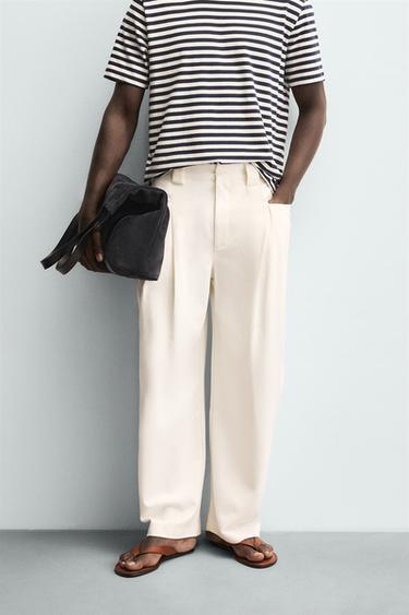 PANTALÓN RELAXED FIT PLIEGUES - Blanco de Zara